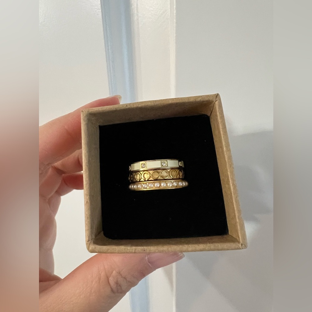 Three Coach stackable rings size 7